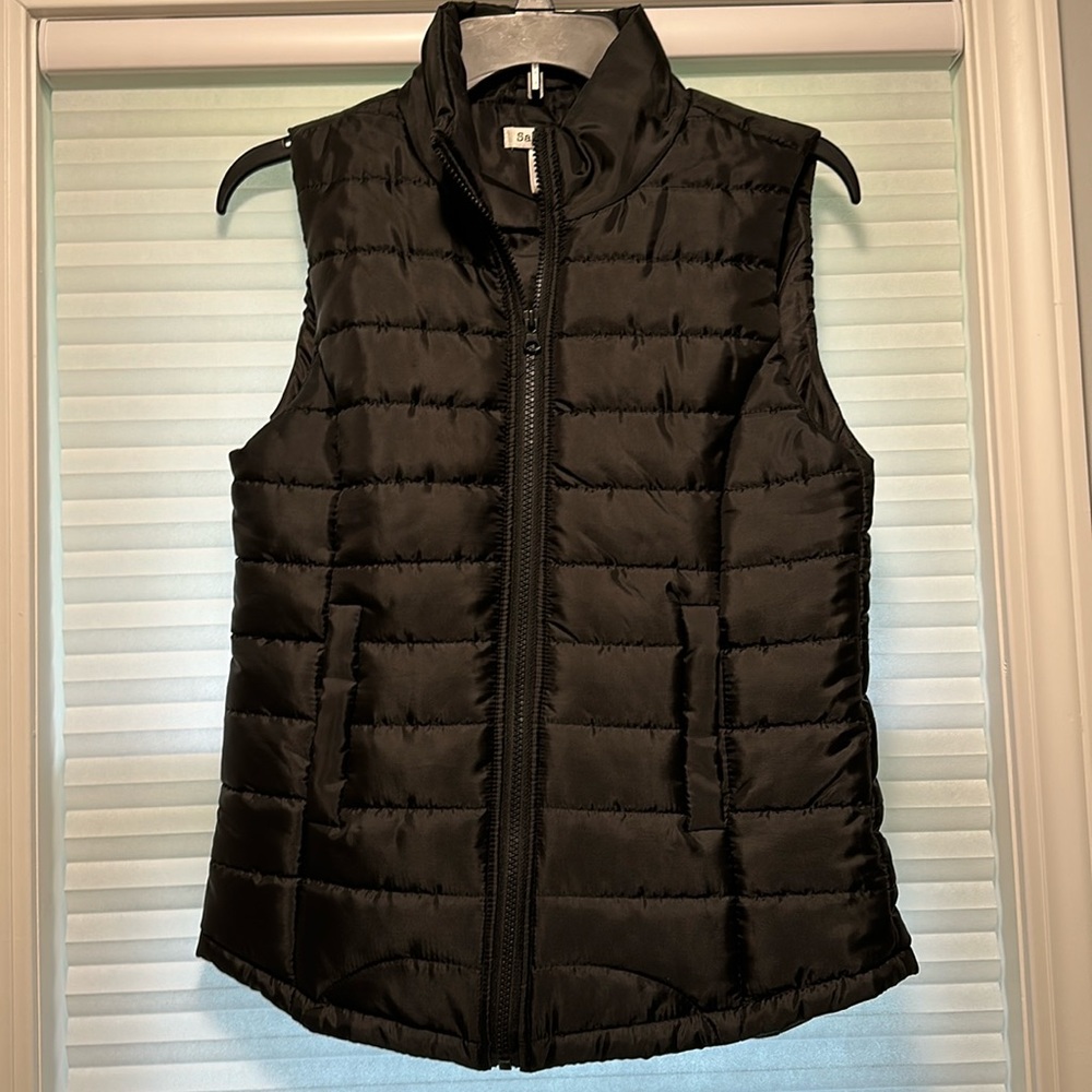 Say what ? Black vest